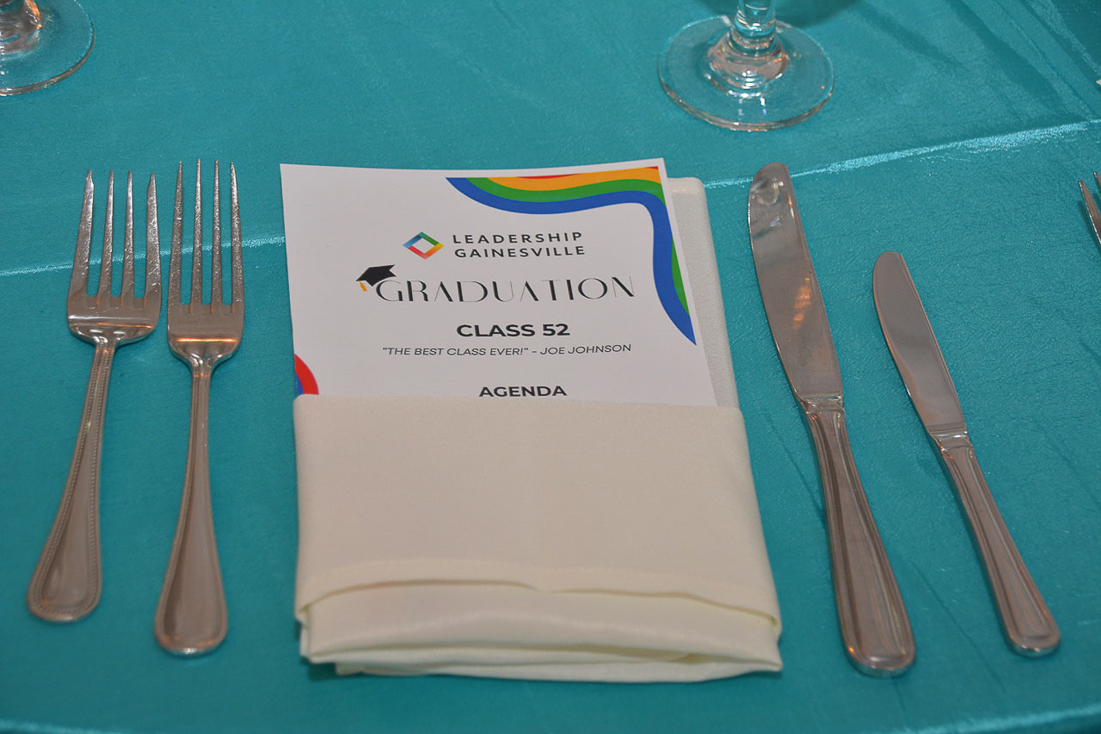 Leadership Gainesville Class 52 graduation program at a table setting